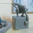 FG World in his Hand Ceramic Sculpture